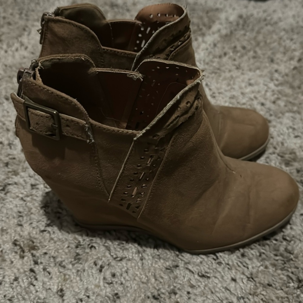 Maurice’s brown wedge booties with cut out details